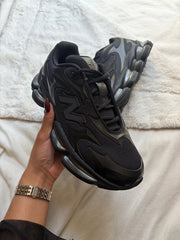 Black New Balance, side view
